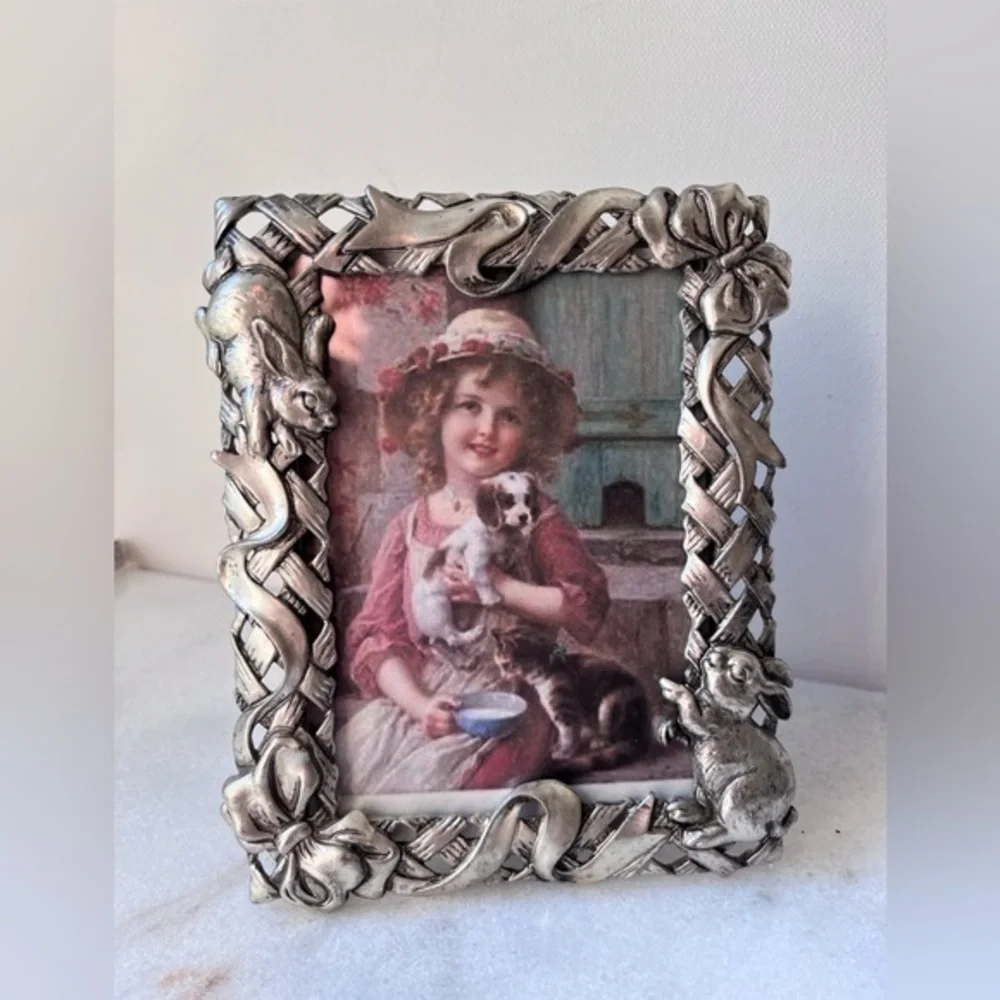 Silver ornate frame with rabbits bunny design picture frame